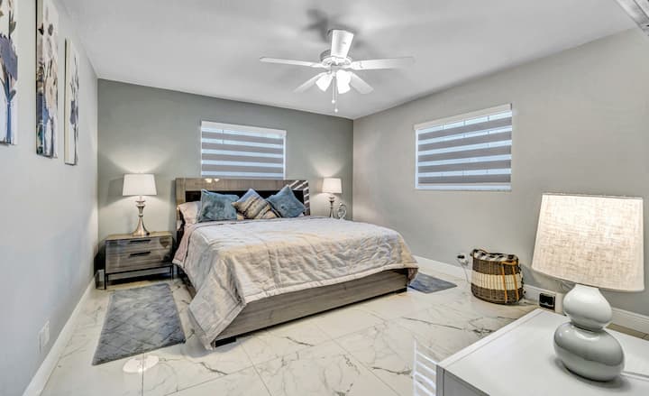 "Clean lines, pops of color, and a touch of minimalist flair - this bedroom is where modern design meets restful slumber."