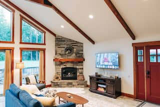 Vaulted living room with fireplace
