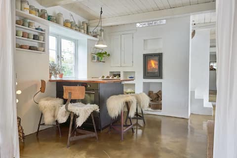 Dream location with indoor fireplace in Gudhjem