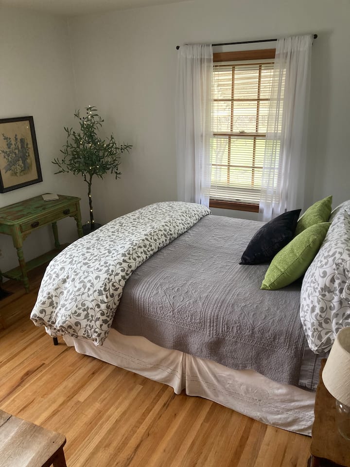 main floor guest room, farm views out both windows, large step in closet, full length mirror