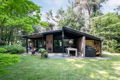 Atmospheric bungalow in the middle of the woods.