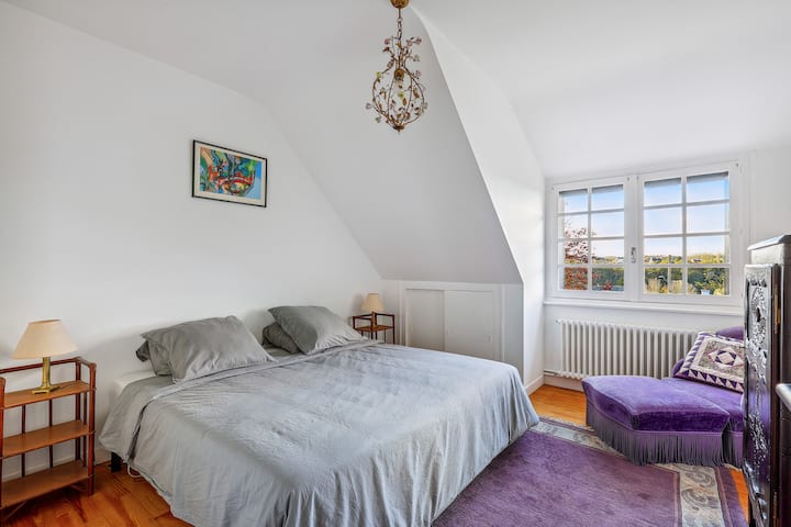 One of the three bedrooms with a large double bed.