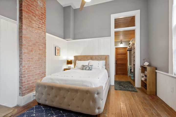 Cozy primary bedroom with walk-in closet and private bathroom