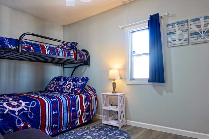 Bedroom 2 bunk bed. Twin on top and full mattress on the bottom.