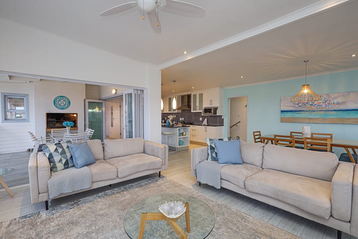 Living area with comfortable sofas in open living area