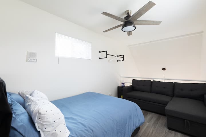 Large Loft Bedroom has a comfy full size bed with drawers and a full convertible sofa bed.  Perfect for extra guests or a kid's room.   Extra bedding is located in the sofa storage compartment.