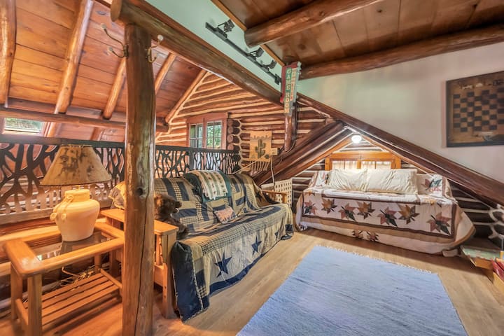 The loft includes a futon and day bed with a trundle. 