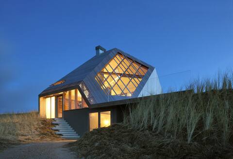 Dune house overlooking the sea