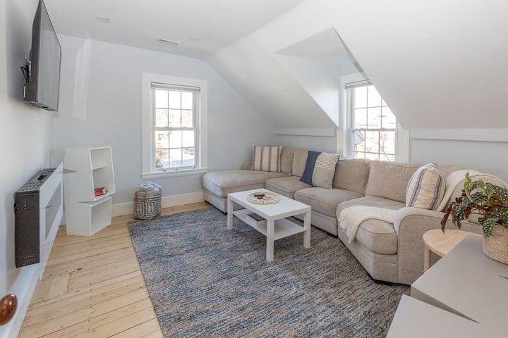 Cozy living room with large sectional, 50" smart Roku TV,  electric fireplace, puzzles games and books.  Black out shades for the afternoon nap.