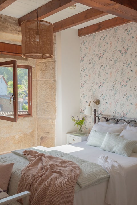 Habitación 10, cama matrimonial en hotel Boutique