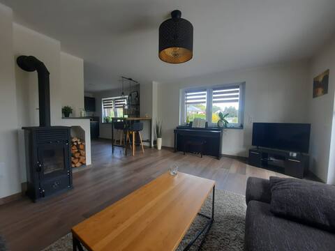 (D) A place in the countryside with a fireplace