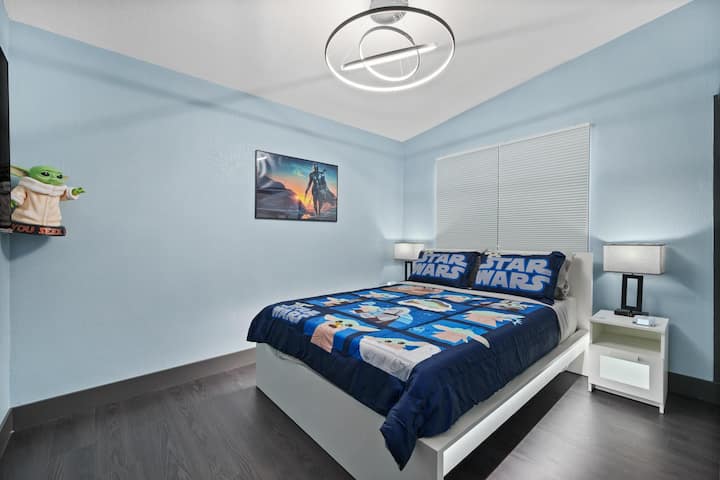 Guest bedroom with Queen size bed and Grogu decor!