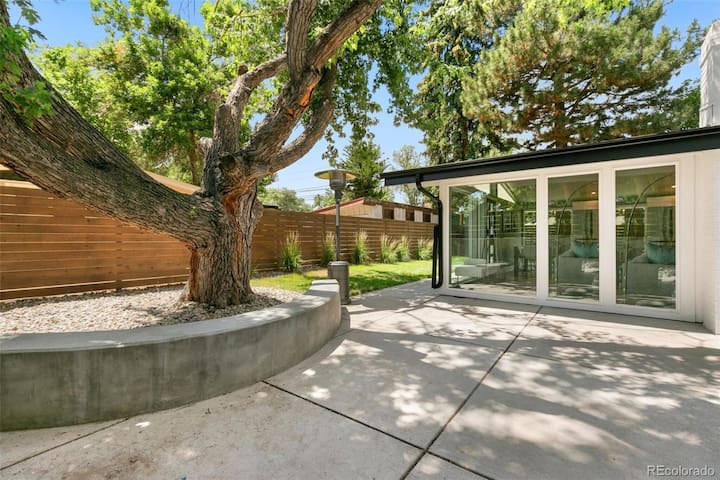 Chic Mid-Mod Cliff May home with hot tub and light