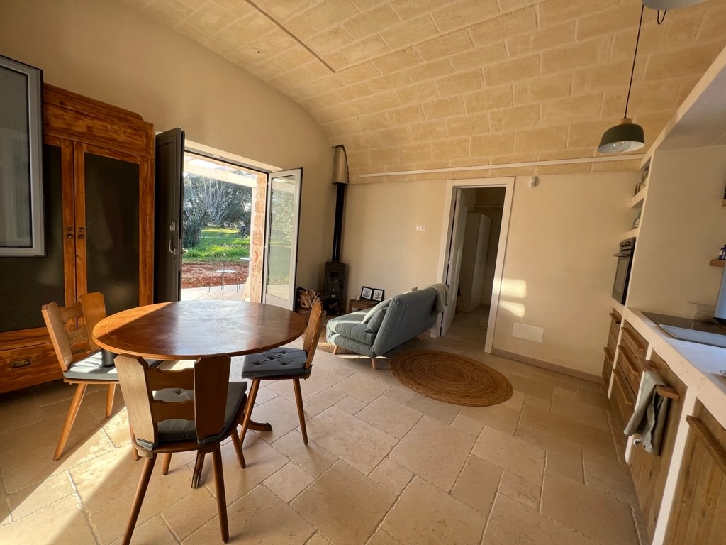 The living room is cozy and has everything you need. Make a fire in the wood stove? Cook the local delicacies? Plan your next excursion? Enjoy a cup of tea? Make a video call? Write a book? Work? The sofa converts to a double bed for extra guests.