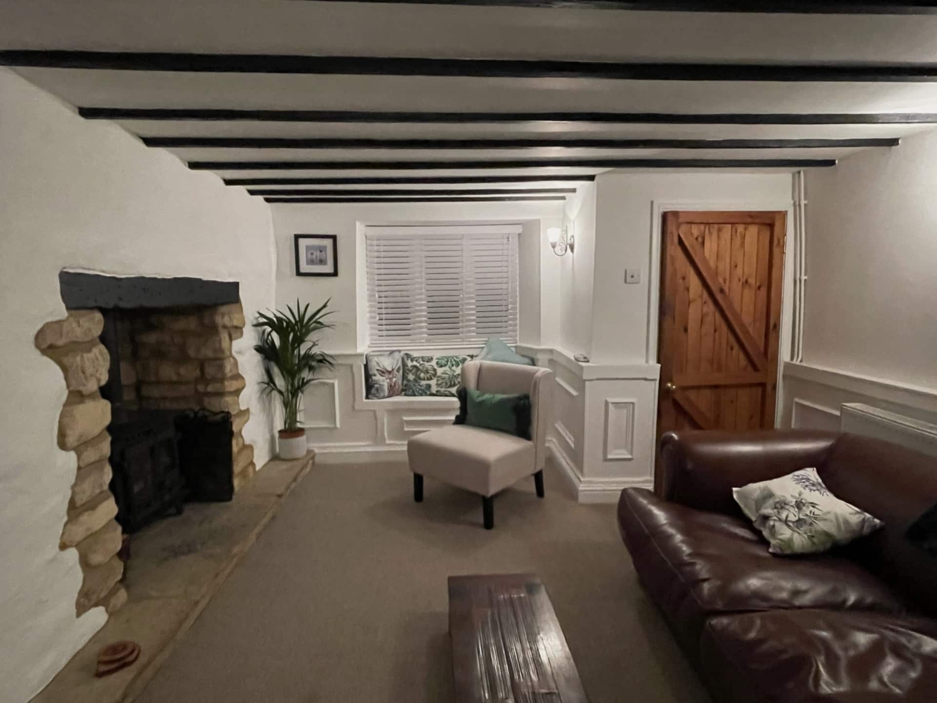 Chocolate box stone built thatched cottage