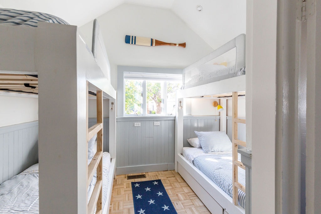 Custom bunk room with twin XL beds perfect for children and adults!  Optional guardrails for added safety.