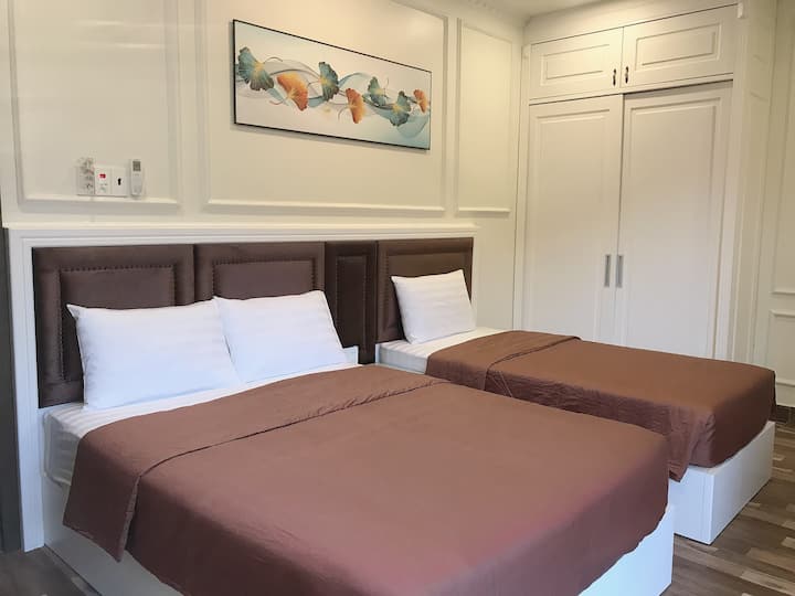 The family room with 2 double beds , moutain view