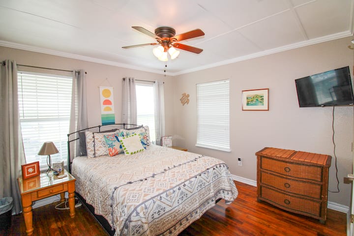 Master Bedroom boasts a Queen bed with Smart TV and large Closet