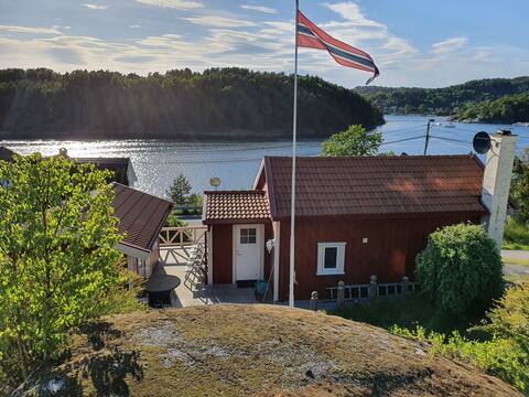 A cozy little house with a lovely sea view