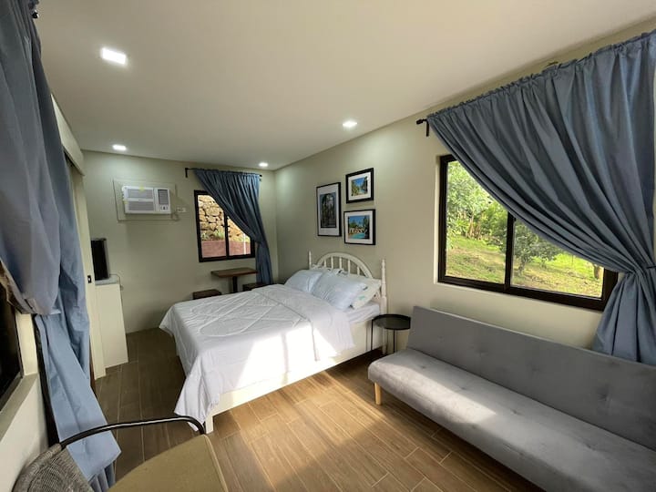 Room 1 of 2 at The Casitas.  

We can accommodate small groups of up to 8 at The Casitas.

For groups of 9-20, they will  stay at The Tee House.

Regardless of the number  of guests, the entire farm  is exclusive for you. 