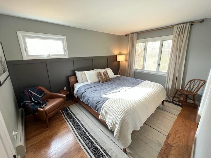 Primary bedroom with king bed and ensuite.