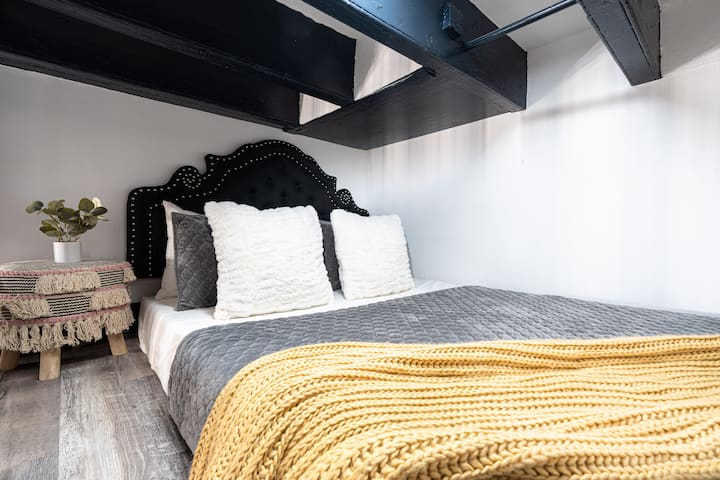 Queen size loft with memory foam mattress. *Must climb ladder*