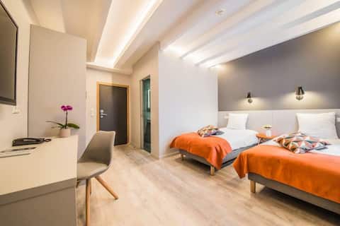 Comfortable chambre triple dans l'Hôtel Mandarina
