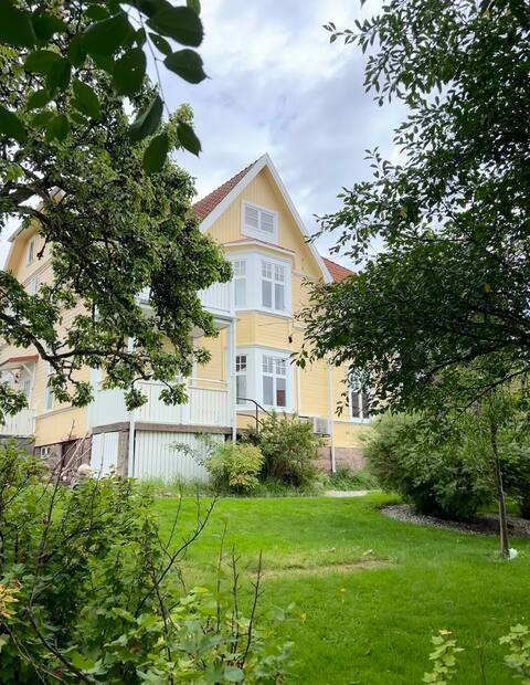 Central private apartment in turn-century villa.