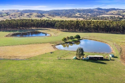 Luxury farm stay in rammed earth converted winery