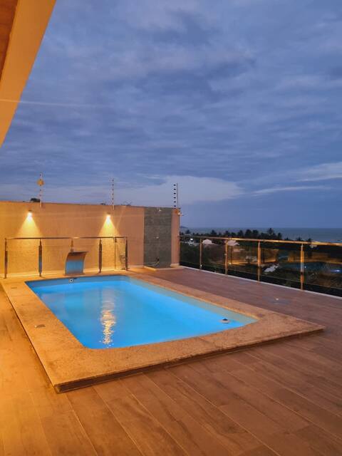Enjoy a house with ocean views and a swimming pool!