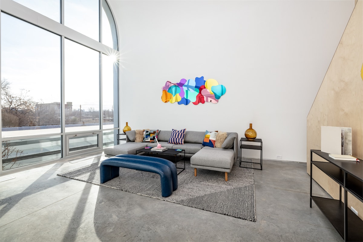 Living Room featuring custom artwork - privacy shade available