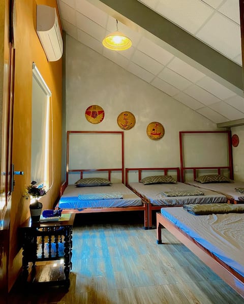 attic dorm room at Homestay Windmill