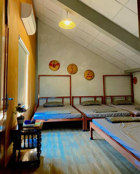 attic dorm room at Homestay Windmill