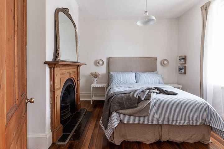 Town Cottage with Fireplace & City Convenience