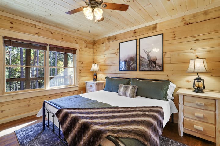 Comfortable secondary bedroom with a king bed and a private en-suite bathroom, offering everyone their own quiet retreat at the end of the day.