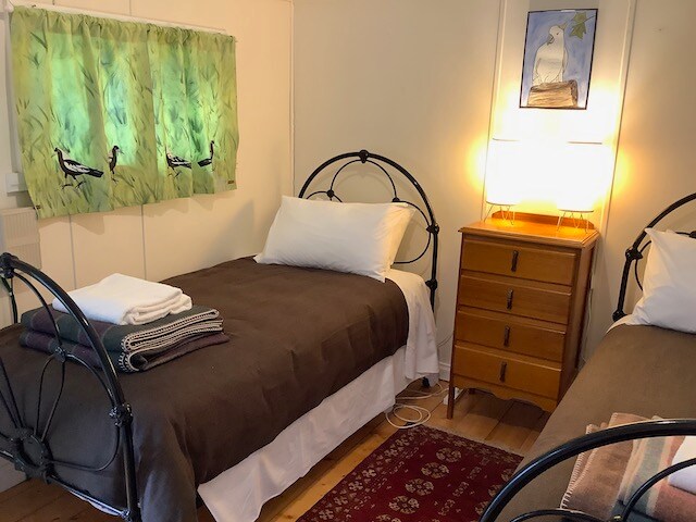 Bedroom 8, located in the garden bungalows at Tasma House.