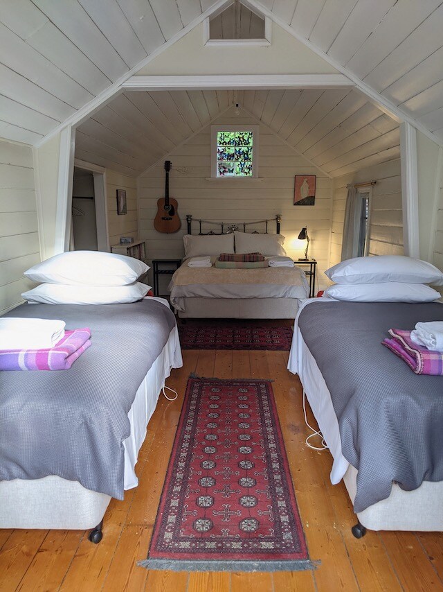 Bedroom 6, located in the garden bungalows.