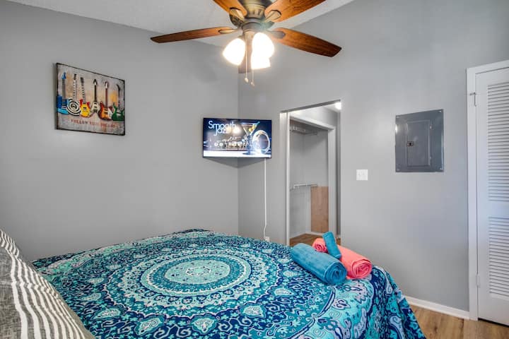 King bed with semi-firm mattress with 40' smart TV.