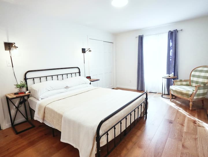 A second queen bedroom on the main floor is spacious with an ensuite bathroom. 