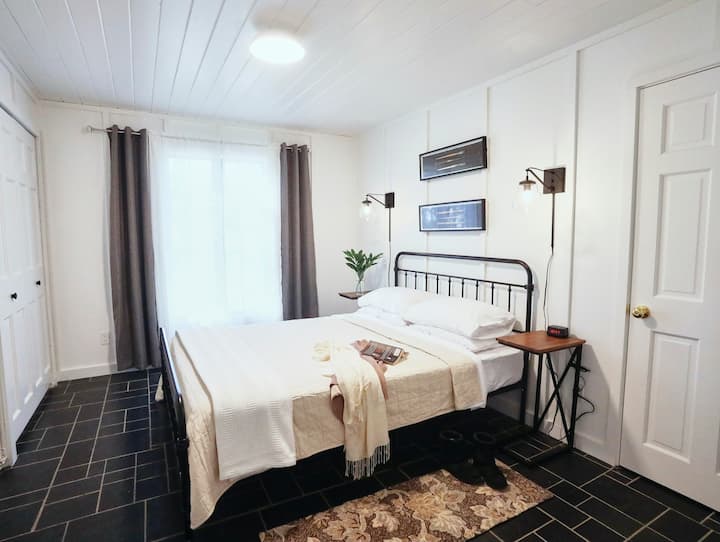 Brand new queen bed with plenty of closet space and a shared hallway bathroom. 
