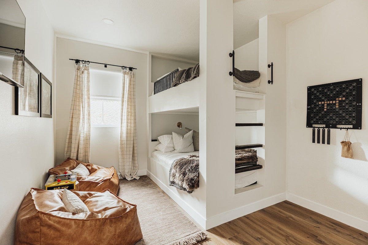 Bedroom 4. Dual full size bunk beds. Memory-foam mattresses. 43 inch 4K Smart TV. Ceiling fan. Game closet for ultimate gamers!