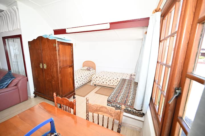 Bedroom 3 (most suitable for children. 2 single beds off of the lounge partitioned by the cupboard) 