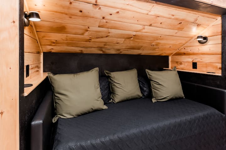 THIS! This little nook is a favorite of so many.  Tucked inside is a day bed that has a trundle under it.  There are two twin beds in the living room space.