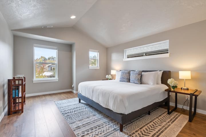 Master bedroom with vaulted ceiling.
