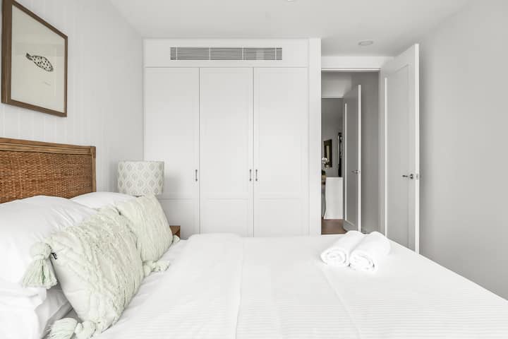 2nd bedroom with large wardrobes