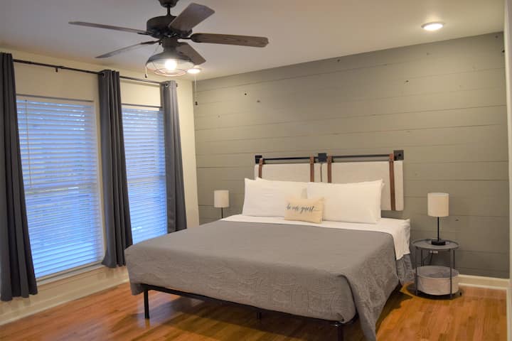 Surround yourself in luxury in the Master Bedroom Suite that overlooks the amazing lake views, with a private exterior door to the upper balcony.  With king bed and functional lamps that sport USB ports, we are sure that you will love it here.