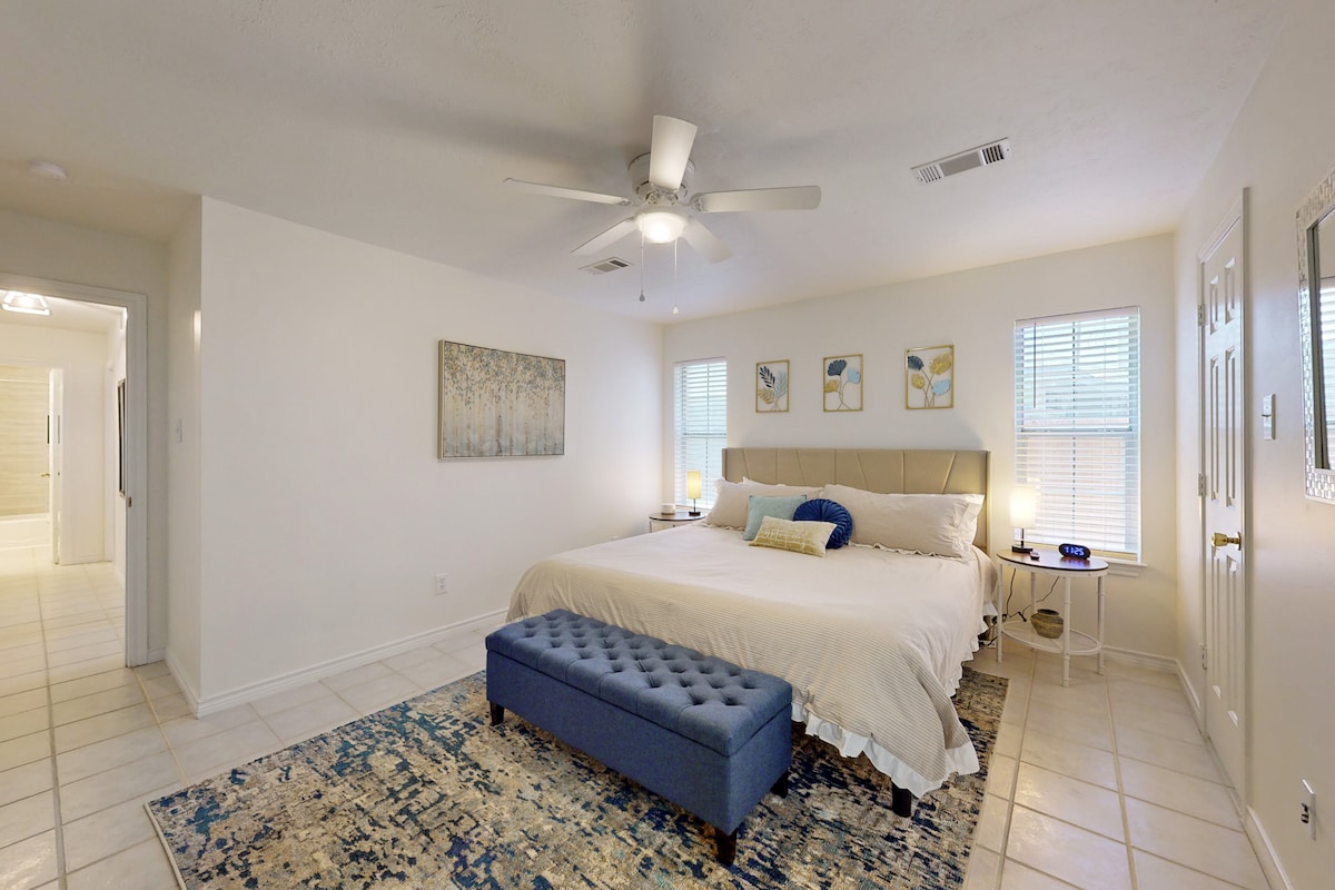 Huge master bedroom with king bed and beautiful en-suite bathroom with walk in shower.