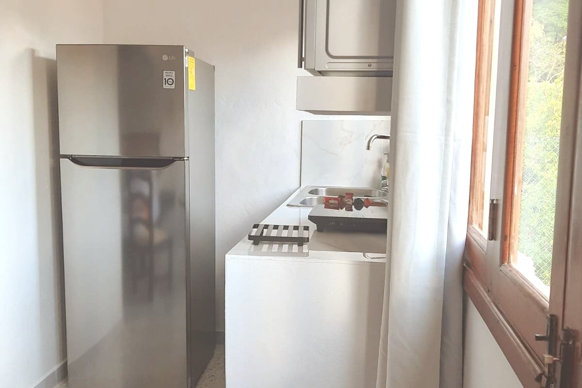 Propiedad de Airbnb exitosa: Lovely King Bed Apartment en Supermanzana 2 A