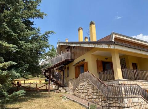 Apartment with fireplace, terrace and garden