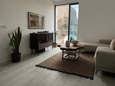 Lovely 1-bedroom loft with a rooftop patio